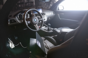 Interior of black BMW getting OBD Flash Tuned