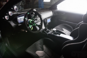 Interior of 240sx Drift car with gauges and custom installed monitors
