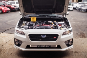 Subaru STi 2015 WRX Front Engine Bay shot infront of our villa park location