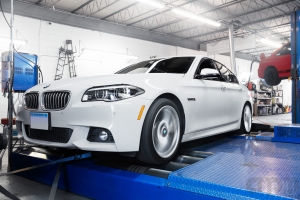 White BMW on Mustang AWD 4WD Dyno Dynamometer