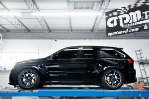 Black Jeep Trackhawk on alignment rack